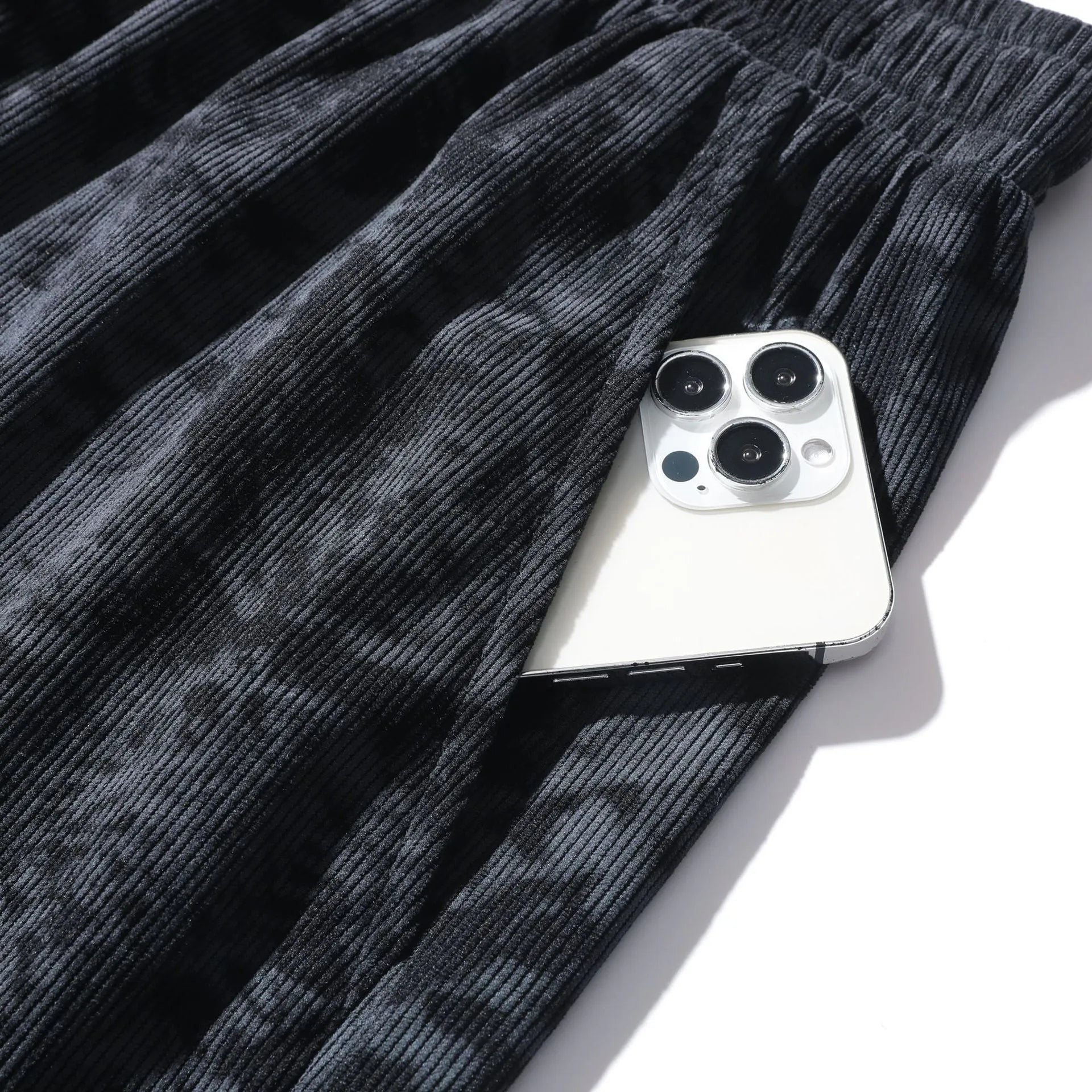 Men's corduroy camouflage athletic shorts in grey with a high-waist and straight-leg design.