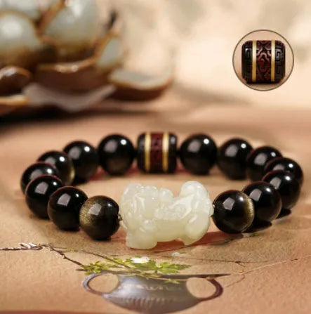 Natural Rainbow Eye Obsidian crystal bracelet in Gold Obsidian or Jade Pi Xiu colours, showing 10mm, 12mm and 14mm bead size options.