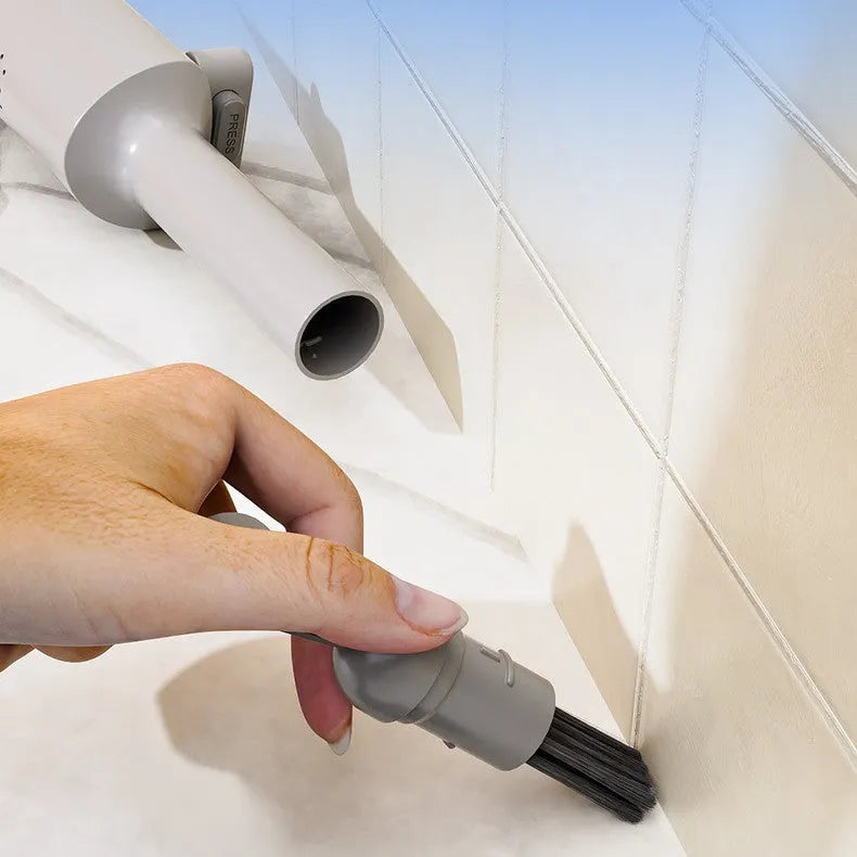 Rotatable self-squeeze mini mop with crevice brush attachment and microfiber pads for compact floor cleaning