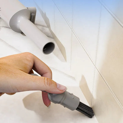 Rotatable self-squeeze mini mop with crevice brush attachment and microfiber pads for compact floor cleaning