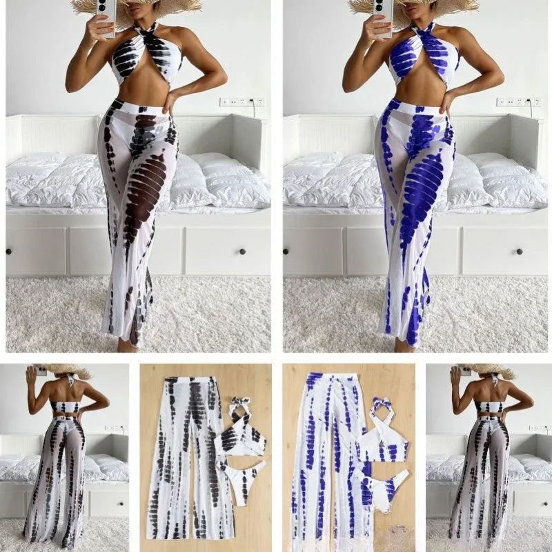 Women's black printed three-piece swimsuit set with mesh trousers laid flat.