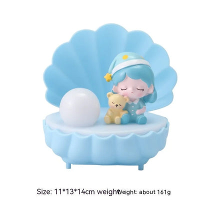 Shell-shaped resin night light with cartoon character design in choice of four colours