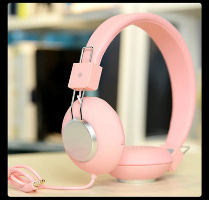 Wired over-ear sports headphones with a microphone, shown in multiple colour options on a white background.