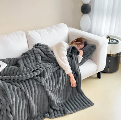 Double-sided bubble velvet faux rabbit fur blanket in a solid colour, shown folded.