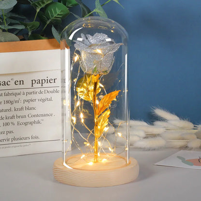 Eternal rose in glass dome with LED string lights, colour options include red, gold, grey, rose red, blue, pink