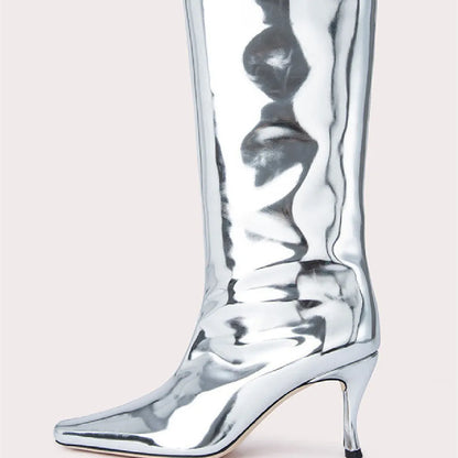 A pair of women's black square-toe cowboy boots made from microfiber leather.
