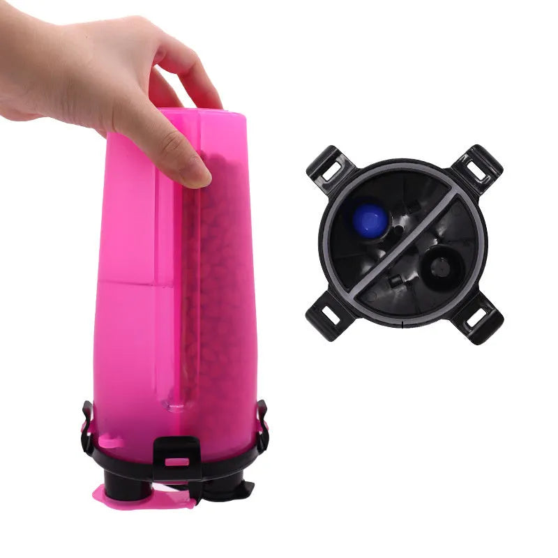 White portable pet water and food cup with separate compartments, shown with blue lid.