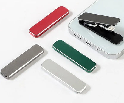 Aluminium folding mobile phone holder with backstick adhesive shown in black colour at 4mm thickness