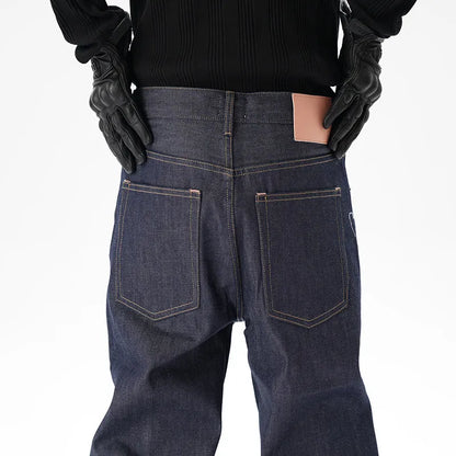 Men's dark blue loose straight-leg denim jeans laid flat, showing front view.