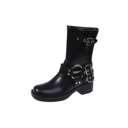 Women's black platform ankle boots with a silver buckle on the shaft, shown in a middle-calf length style.