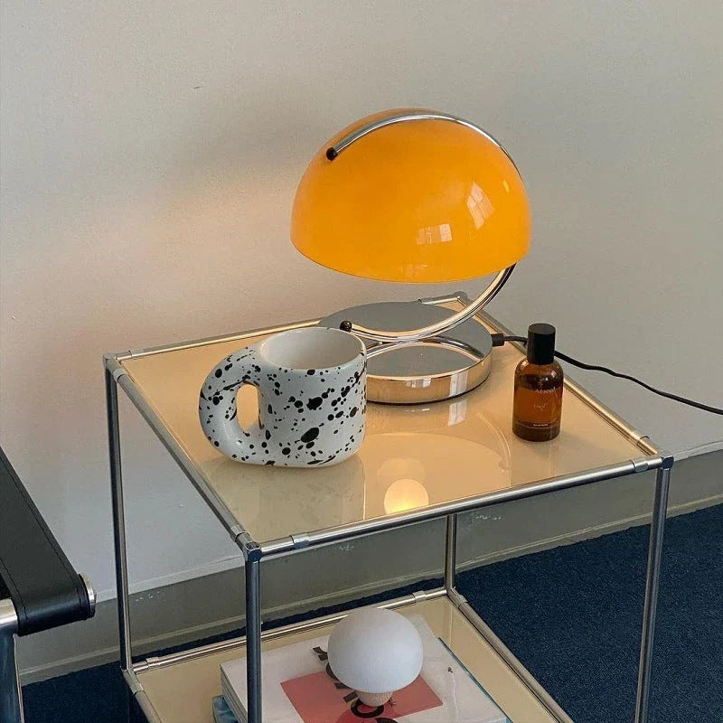 Retro-inspired table lamp with adjustable lighting modes, sleek minimalist design, and energy-efficient LED technology