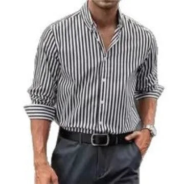 Man modelling a khaki and white striped loose-fit long sleeve casual button shirt.
