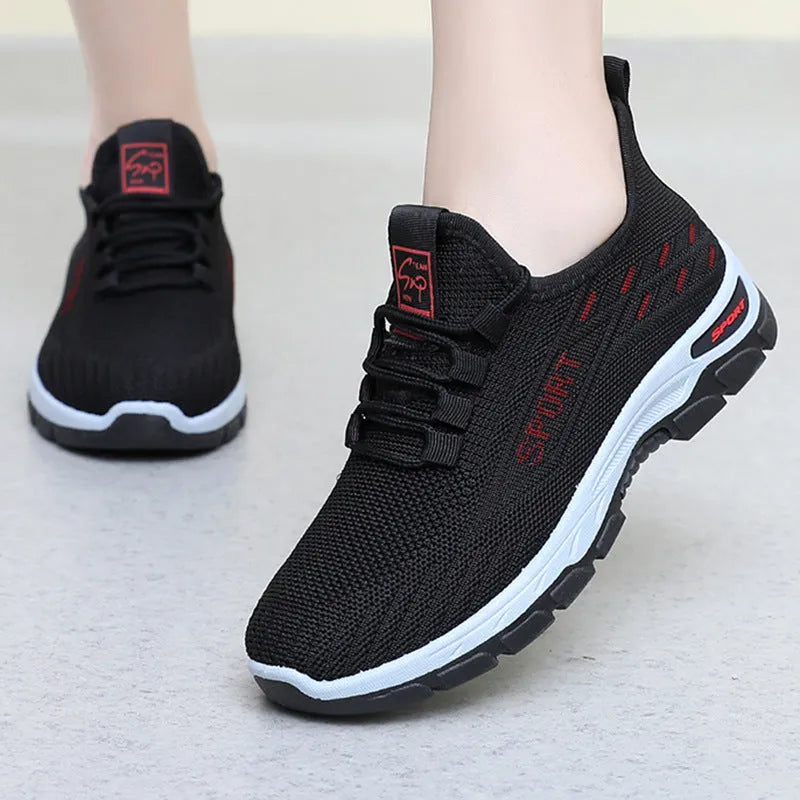 Casual low-top sneaker with PVC injection moulded sole in black colour showing rounded toe and shallow mouth design