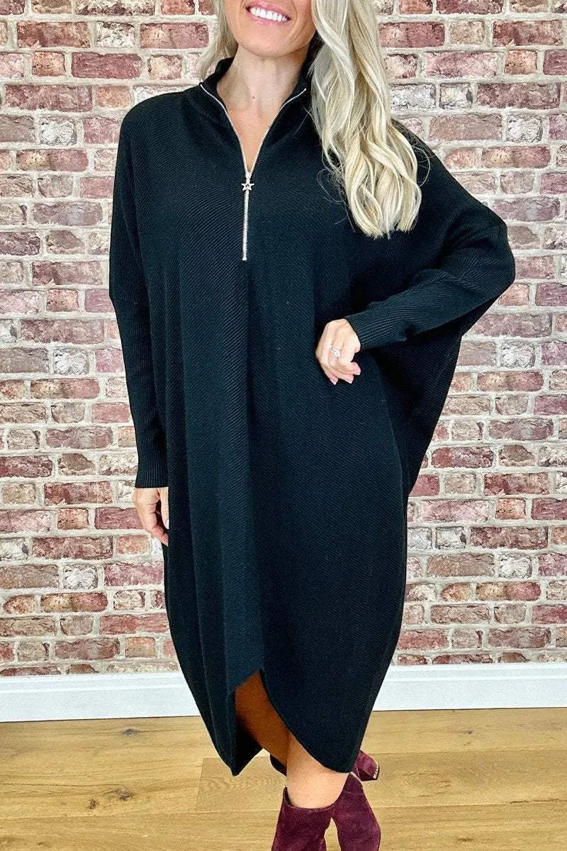 Women's solid colour loose knitted dress with a front zipper and raglan sleeves.