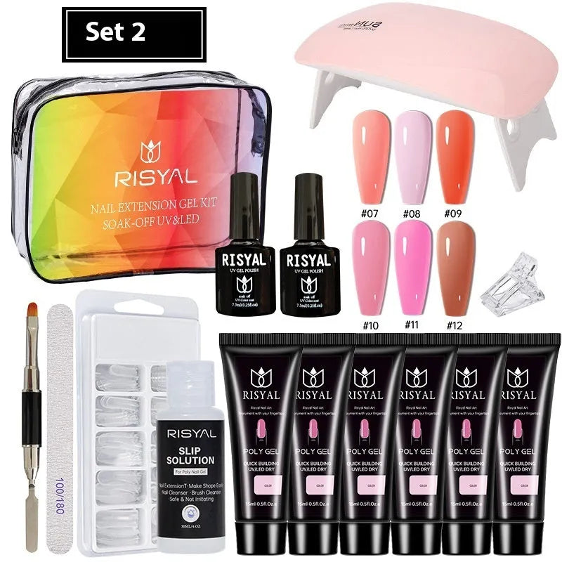 UV nail extension kit with polishes, mini lamp, glues, and metal tools in a zipper bag