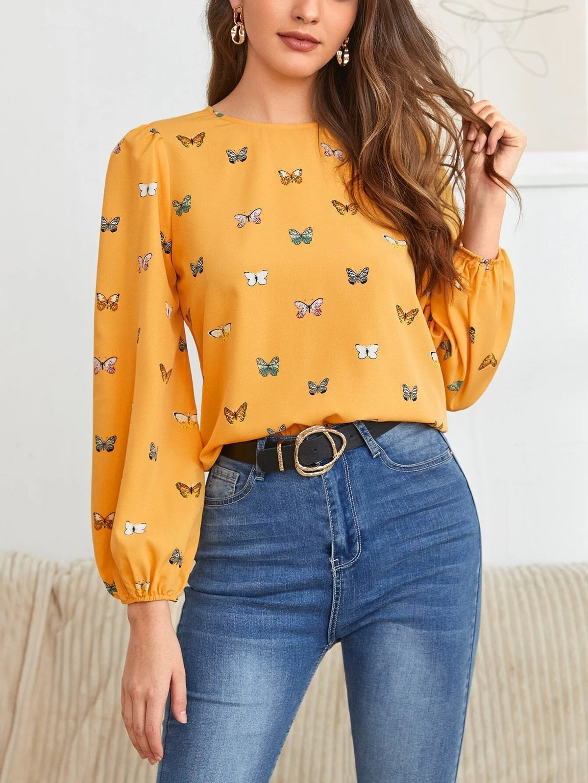Women's butterfly print long-sleeved shirt in loose fit available in green or orange colours