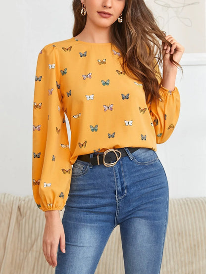 Women's butterfly print long-sleeved shirt in loose fit available in green or orange colours