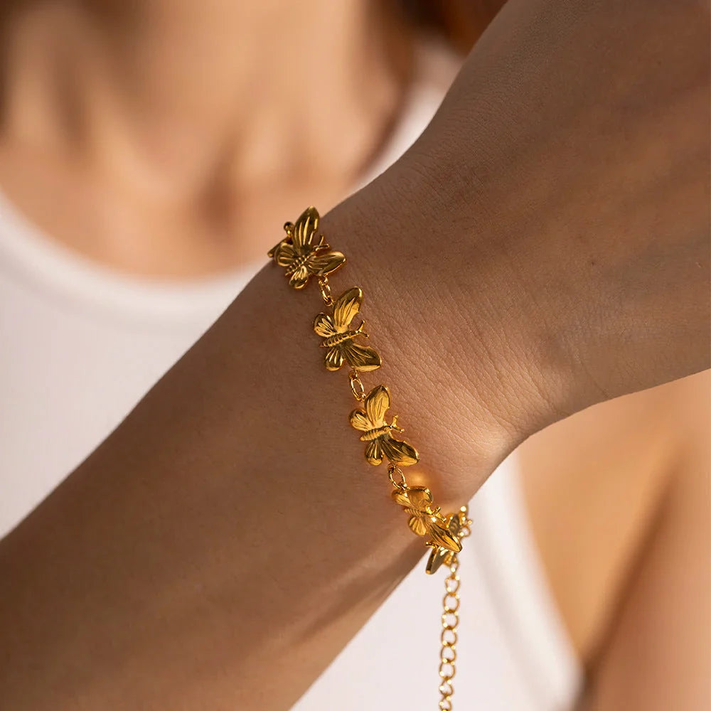 Elegant stainless steel bracelet with delicate butterfly design, available in a variety of fashionable colours