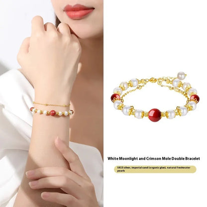 Double-layer women's bracelet with freshwater pearls and geometric cinnabar beans on sterling silver