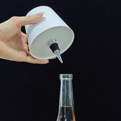 Wireless LED desk lamp in black tricolour finish, bottle-shaped with detachable base and touch control for 2000mAh powered lighting