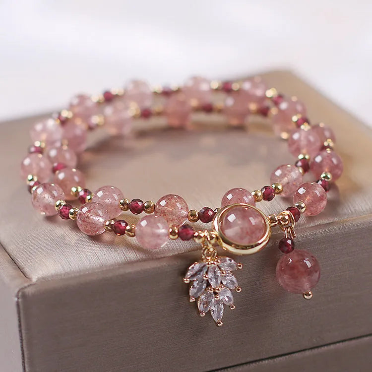 Red Cat's Eye Flower colour double-layer strawberry quartz crystal bracelet with lucky cat charm.