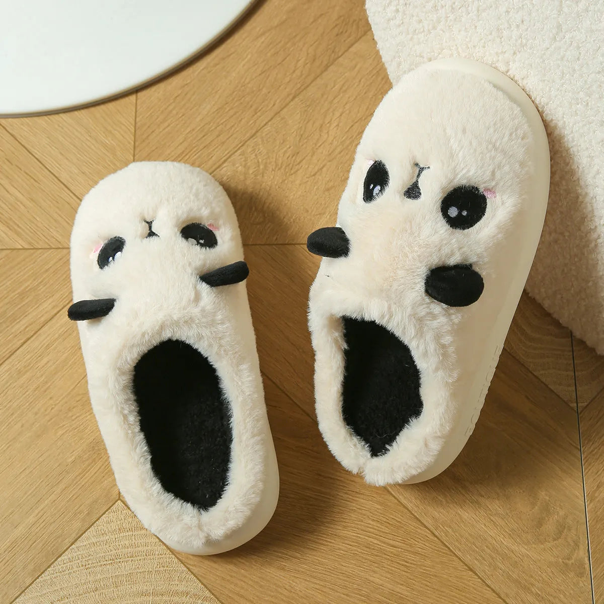 Panda print cotton and linen toe ring slippers with a light coloured non-slip PVC sole.