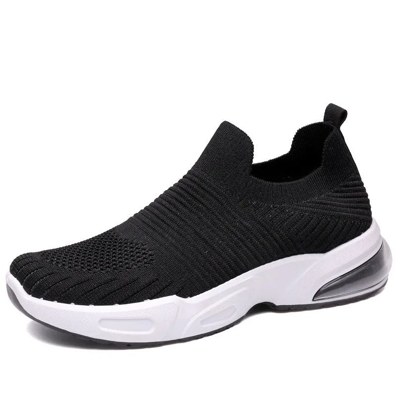Slip-on breathable mesh sock shoes with a low-top design and PVC sole, shown in a neutral colour.