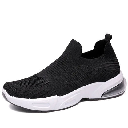 Slip-on breathable mesh sock shoes with a low-top design and PVC sole, shown in a neutral colour.