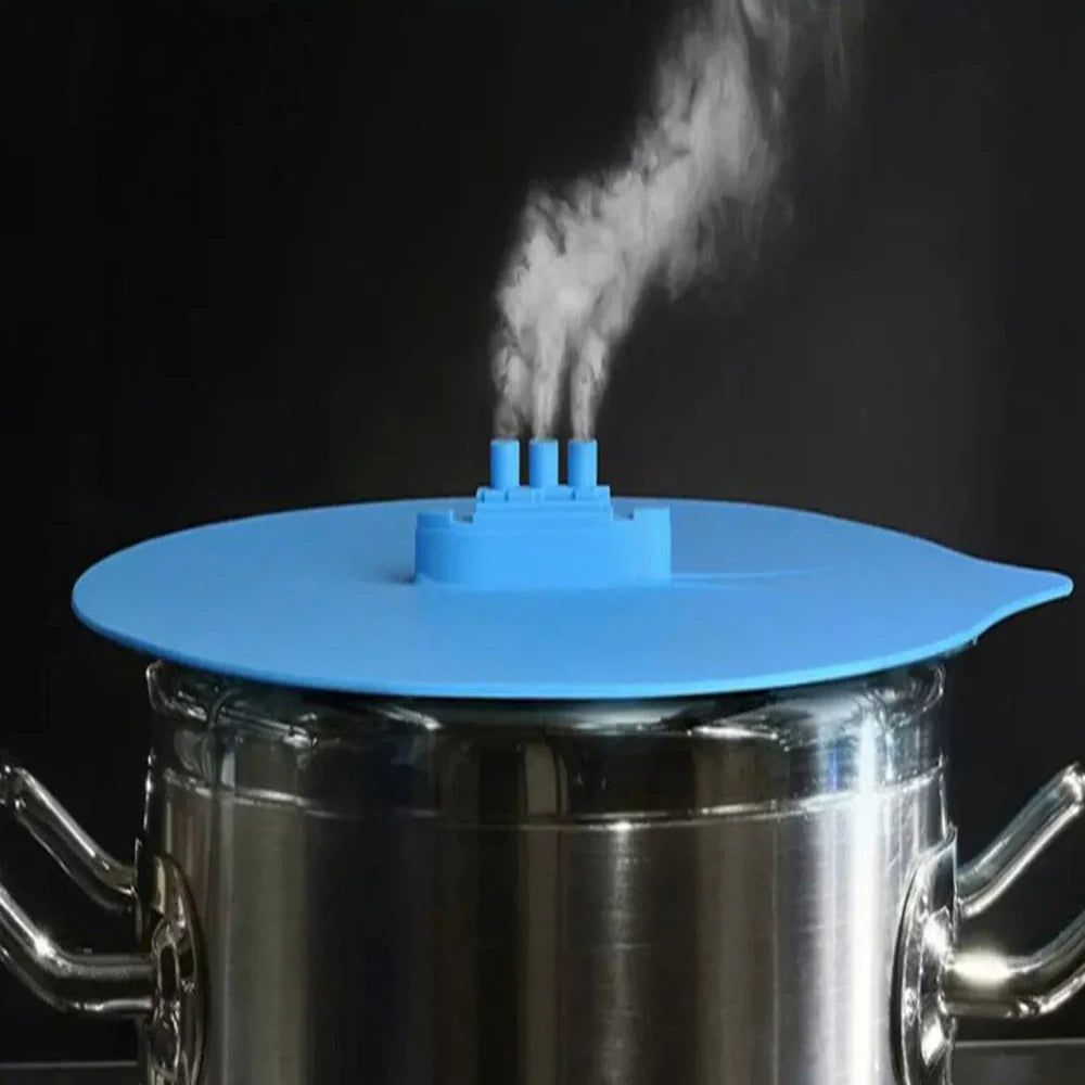 Blue silicone steamer lid on kitchen bowl showing airtight seal and flexible edges