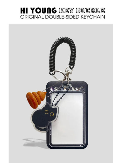 Cartoon cat design plastic card holder sleeve with a metal ferrule pendant clip attached.