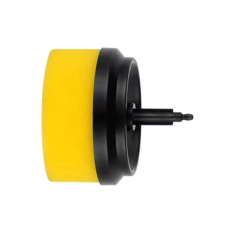 Green electric cleaning brush with multiple brush heads on a kitchen worktop.