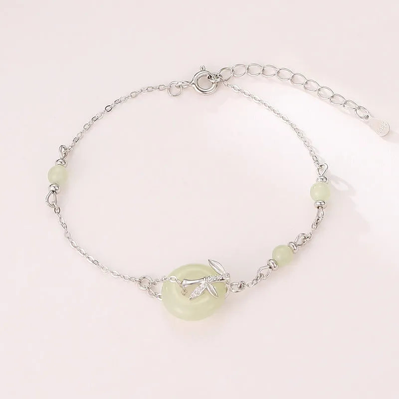 Women's antique style silver bracelet with a safety peace buckle on a 925 sterling silver chain.