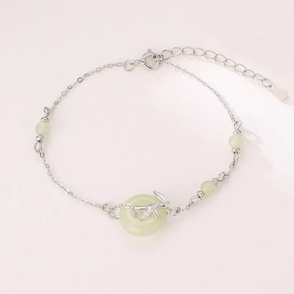 Women's antique style silver bracelet with a safety peace buckle on a 925 sterling silver chain.