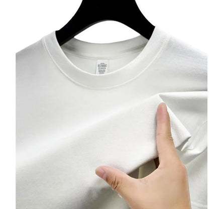 Men's thin cotton drop shoulder t-shirt on a hanger, shown in a light colour.