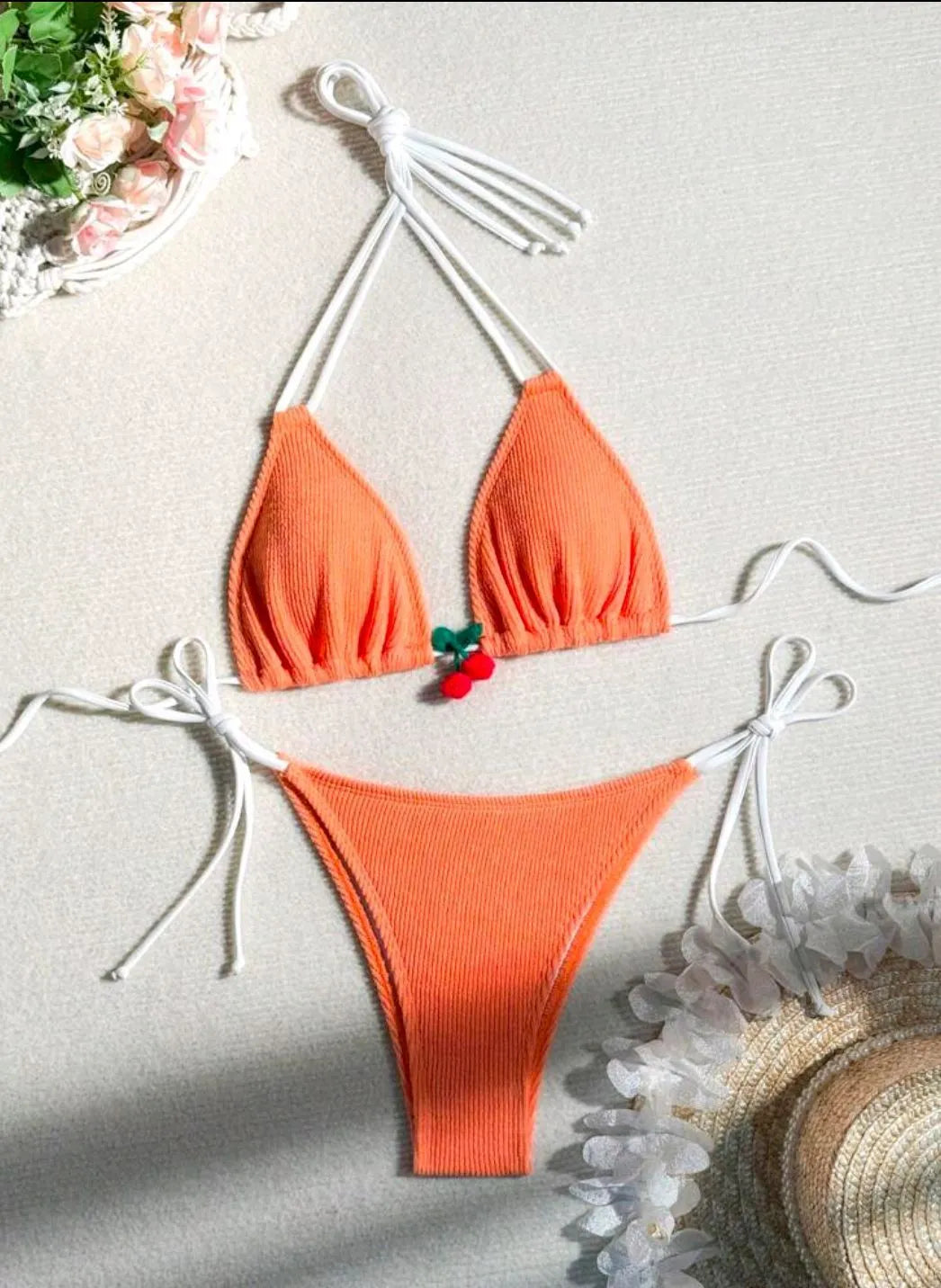 Women's sexy wind style bikini swimsuit in a solid colour, showing backless briefs design.