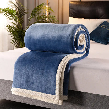 A thick, plain coral fleece blanket in a choice of colours, folded to show its texture.