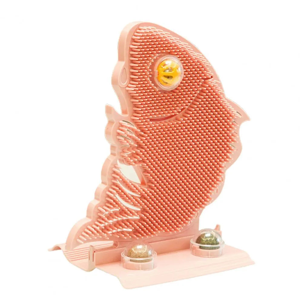 Blue plastic fish-shaped cat wall scratcher with grooming brush, catnip balls, and bell