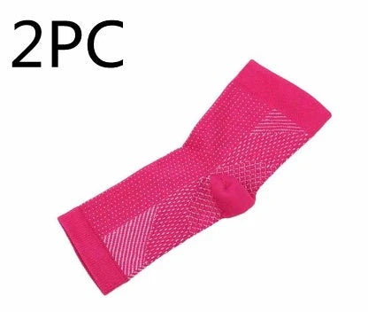 Anti-fatigue compression foot sleeve in black, red, or white, featuring moisture-wicking fabric and a heel hole for breathability.