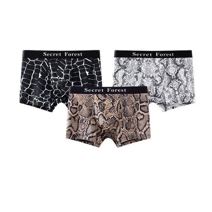 Men's loose fit polyester boxer shorts in black colour showing mid-waist design