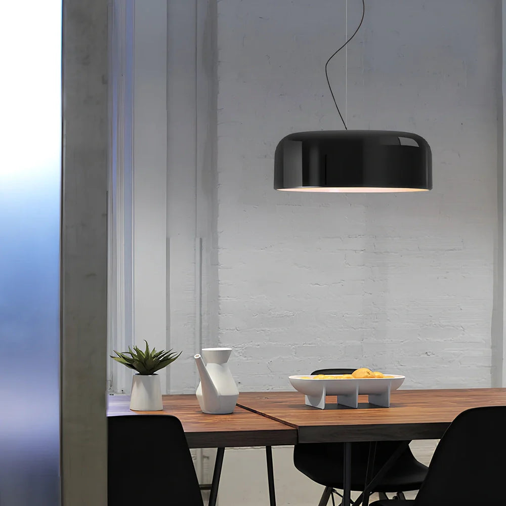 Scandinavian 35cm linear glass chandelier in black aluminium with warm light over dining table