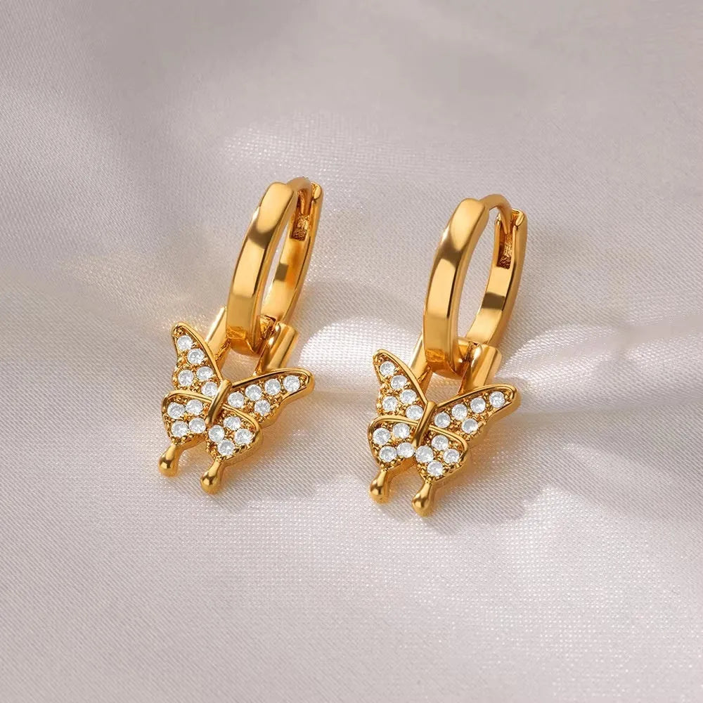 Women's copper geometric butterfly earrings with diamond treatment in heart, bow, and star shapes, multiple colour options