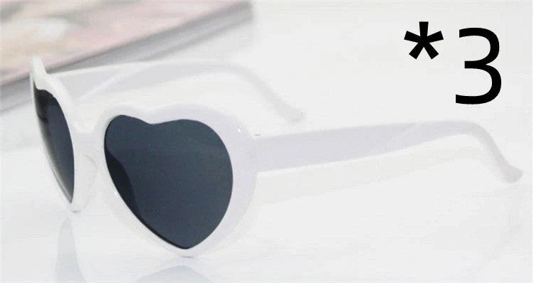 Fashionable heart-shaped light-up glasses with a built-in LED lighting system, perfect for adding a touch of love and playfulness to any occasion.