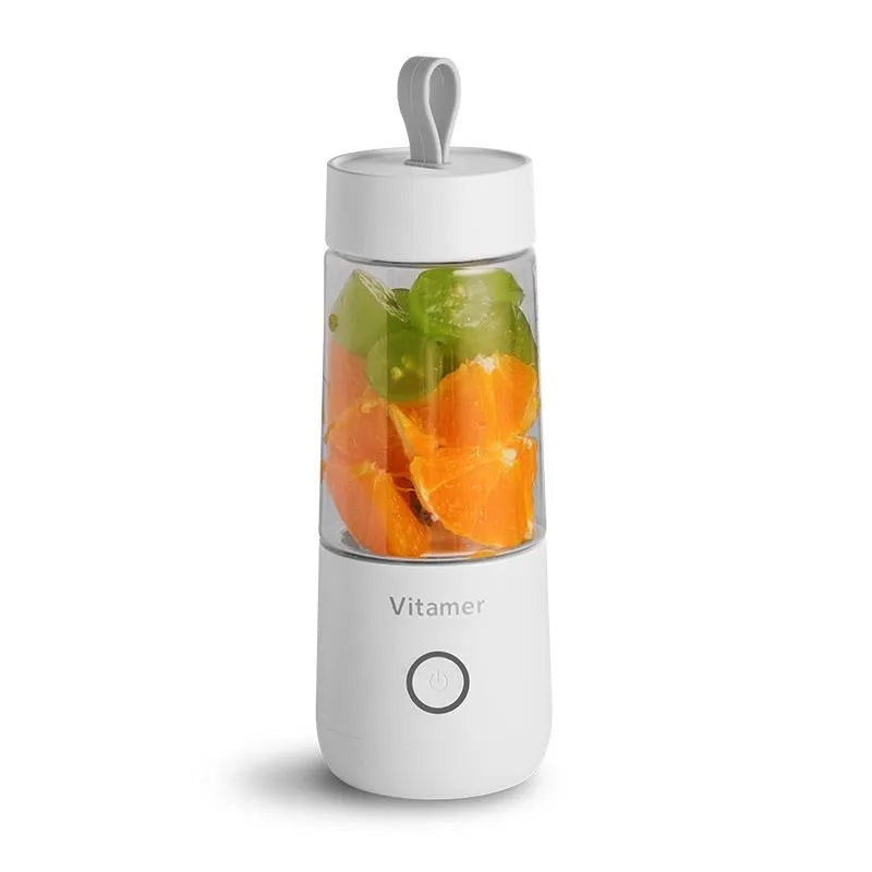 White portable USB rechargeable blender bottle with silicone handle on a Tritan cup.