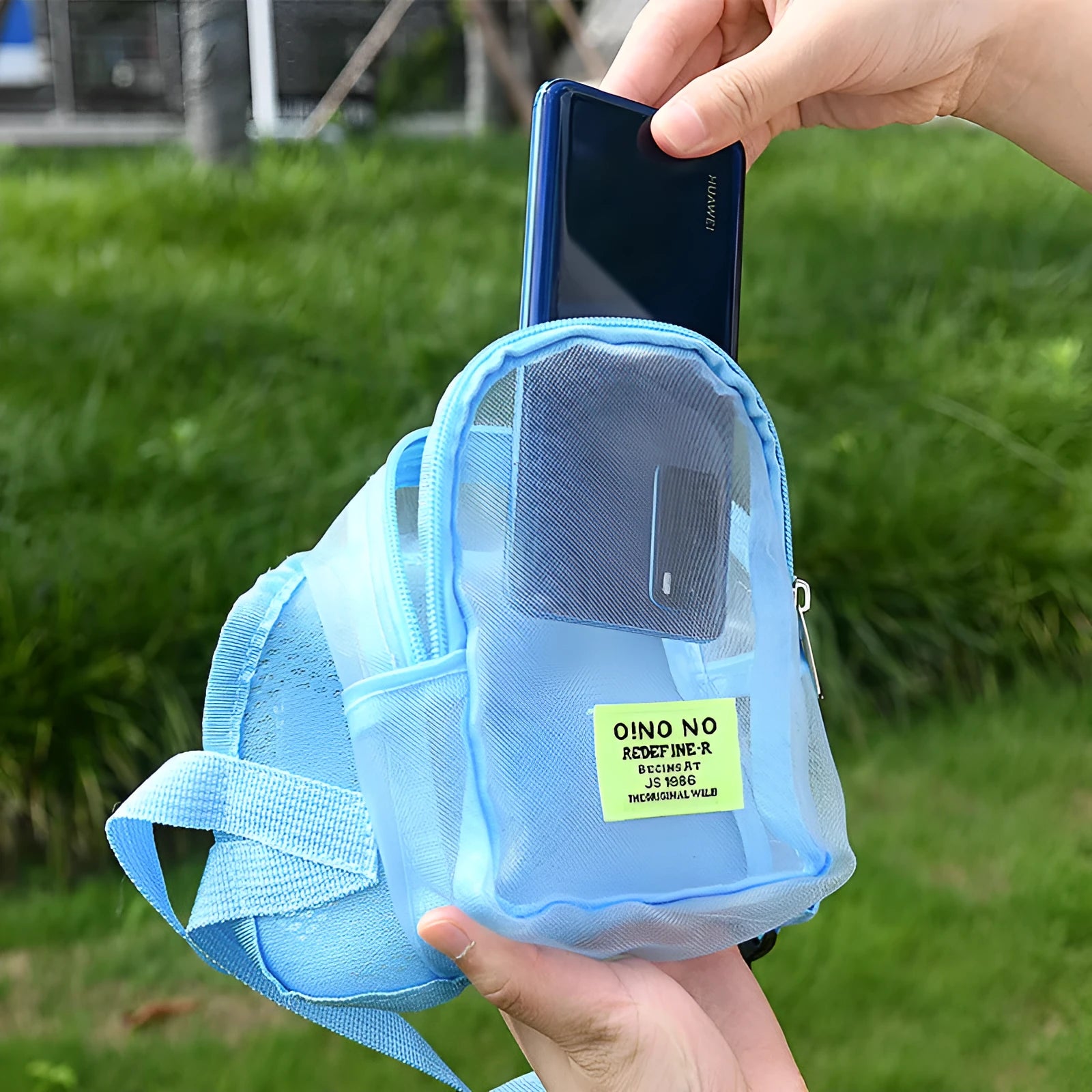 Solid colour dog backpack with breathable mesh panels for pet ventilation.