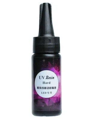 A compact metal UV dryer lamp with a timer dial and two UV LED bulbs for curing resin.