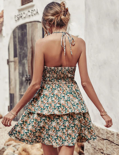 Chic backless halter dress with ruffled A-line skirt in various vibrant colors