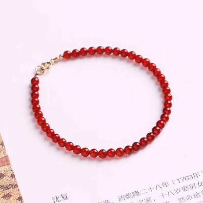 Ultra-thin red agate women's bracelet in classic style on wrist