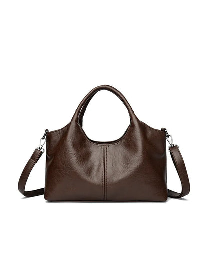 Women's soft genuine leather large crossbody bag shown in available colours: black, brown, wine red, yellow, beige, bronze, green.