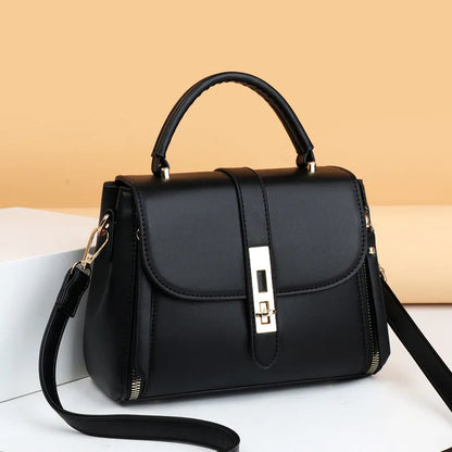 Soft black PU leather women's messenger bag with adjustable strap, showing square shape and front flap.