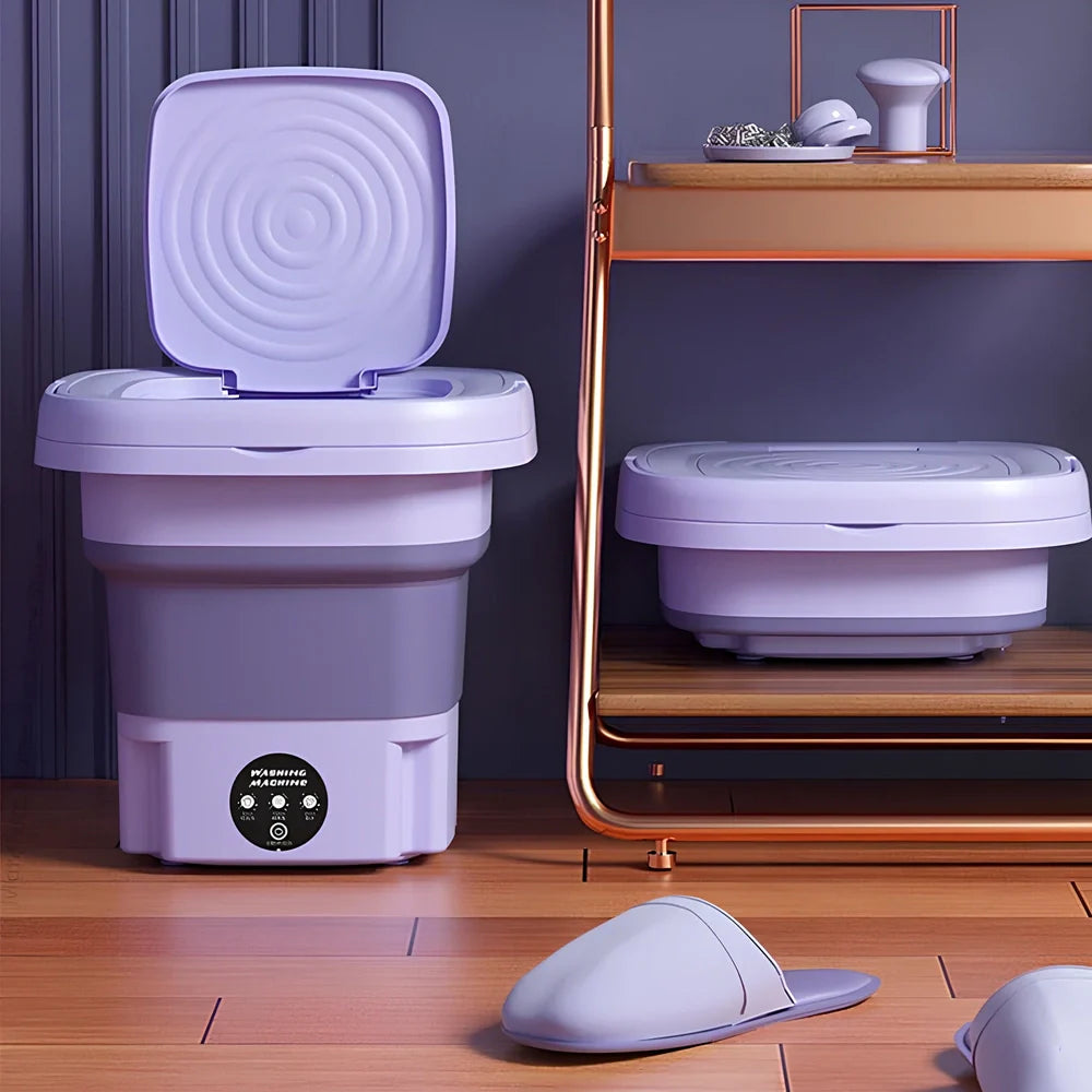 Green folding washing machine measuring 26x26x27cm with USB power cable and mechanical dial controls